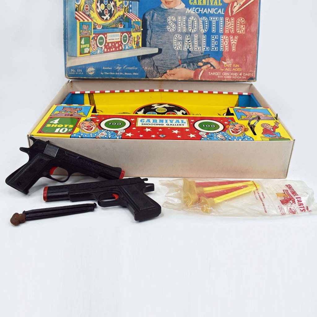 https://www.unclealstoys.com/wp-content/uploads/2021/06/Carnival-Shooting-Gallery-by-Ohio-Art-Tin-Wind-Up-Toy-With-Guns-And-DartsBox-2-1-1024x1024.jpg